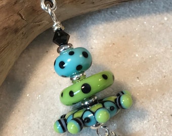 Necklace green, blue, black glass lampwork beads by Chestnutridge Designs  with crystals