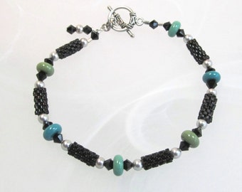 Beaded bracelet, blue green glass art lampwork beads with peyote stitch beads, crystals and faux pearls