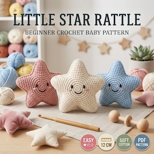 May include: Three crocheted star rattles in dusty pink, cream, and light blue, each with embroidered faces. A wooden crochet hook is placed in front, marked 4.2mm. A circular icon indicates a 12 cm size. Text reads LITTLE STAR RATTLE.