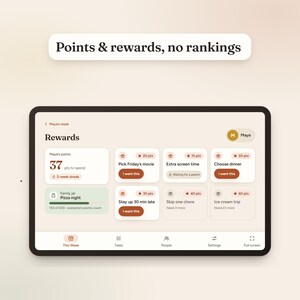 May include: A digital tablet screen displaying a rewards interface with the text Points & rewards, no rankings. The screen shows Maya's points, a 2-week streak, a family jar for pizza night, and various reward options like movie picking.