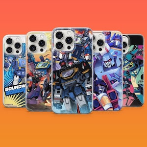 Peut inclure: Cinq coques de smartphone présentant des illustrations graphiques colorées de personnages Transformers. Les designs incluent Soundwave, Megatron et d'autres figures robotiques dans des tons bleu, violet et noir, avec le texte SOUNDWAVE visible.