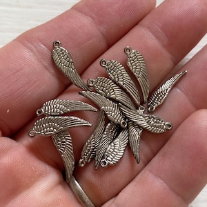 metallvingar berlockpärlor