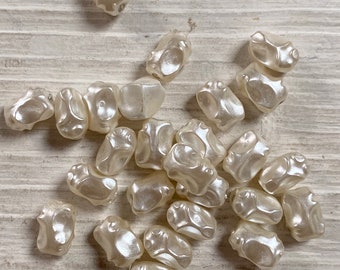 Grosse perles en plastique nacré vintage