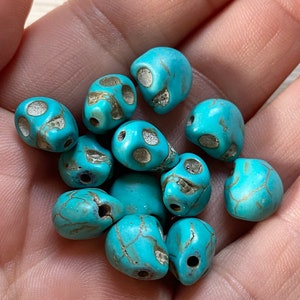 Blue howlite skull beads