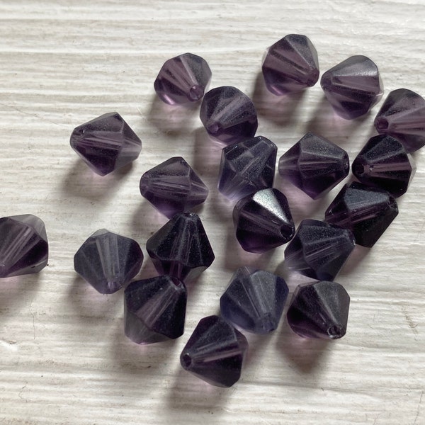 Semi frosted purple bicone beads