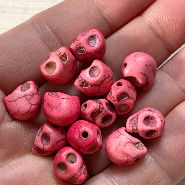 Pink howlite skull beads