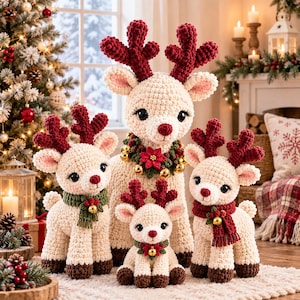 May include: A set of four cream-coloured crocheted reindeer figures with dark red antlers and brown hooves. The reindeer wear festive scarves or collars adorned with small bells and red poinsettia accents, featuring large black eyes and eyelashes.