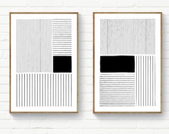 May include: Two black and white abstract line art prints in wooden frames. The prints feature geometric shapes and lines.