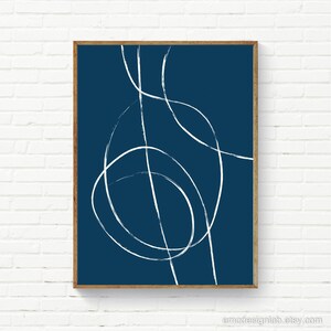 May include: Abstract art print with white lines on a dark blue background. The lines are curved and create a sense of movement.