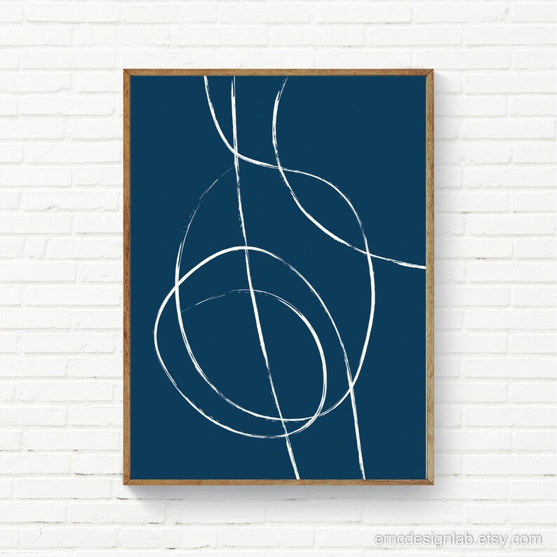 May include: Abstract art print with white lines on a dark blue background. The lines are curved and create a sense of movement.