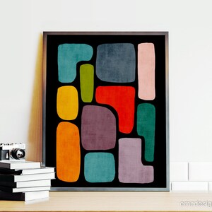 May include: Abstract art print with a black background and colorful geometric shapes in shades of red, orange, yellow, green, blue, purple, and pink.