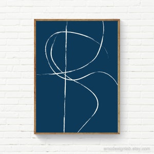 May include: Abstract art print with white lines on a dark blue background. The lines are simple and organic, creating a modern and minimalist design.