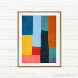 May include: Abstract geometric art print with a colorful design featuring blue, red, yellow, orange, and green squares and rectangles.