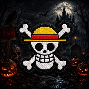 May include: A circular embroidered patch featuring the One Piece skull and crossbones logo, characterized by a white skull wearing a yellow straw hat with a red band, set against a black background with a thick black stitched border.