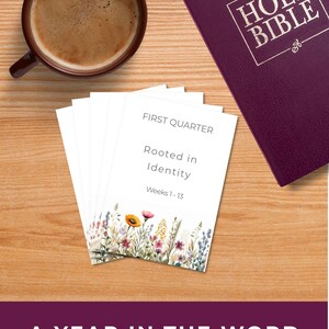 May include: A stack of white cards with the text FIRST QUARTER, Rooted in Identity, and Weeks 1-13, featuring a colourful floral illustration at the bottom. Next to it is a dark purple Holy Bible and a brown mug filled with coffee.