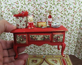 Christmas table Dollhouse Miniature. Beautiful sideboard xmas. Christmas furniture in  red with details for the Xmas decoration.