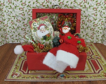 Dollhouse Miniature tunk decorated with Christmas items. Miniatures for dollhouse collectors. 1:12 Dollhouse Miniature  red chest Xmas toys