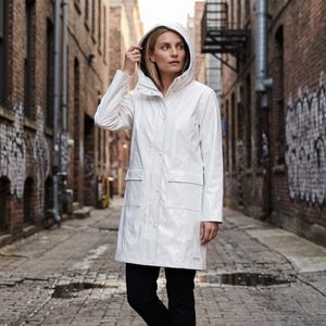 White Patent Leather Raincoat, Glossy Vinyl Hooded Mac, Women's Minimalist PVC Jacket, Retro Mod Slicker, Monochrome Festival Outerwear,