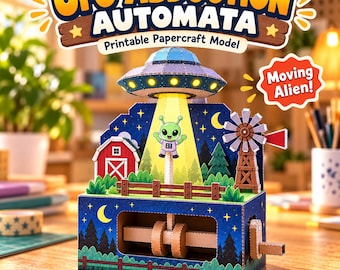 Puede incluir: Un modelo de papel automata UFO abduction que muestra a un alienígena verde siendo elevado por un platillo sobre una granja con un granero rojo y un molino. La base incluye una manivela y el texto UFO ABDUCTION AUTOMATA.