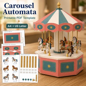 May include: A paper craft carousel automata model with a striped pink and teal canopy, gold poles, and several horses. Beside the model are printed sheets labeled Carousel Automata Printable PDF Template A4 + US Letter showing parts and assembly instructions.