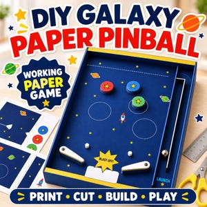 May include: A DIY galaxy paper pinball game kit featuring a blue board with space-themed graphics, including planets, stars, and a rocket. The set includes circular game pieces, white flippers, a metal ball, and printed sheets for assembly.