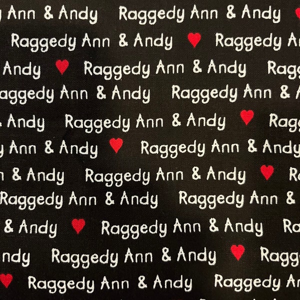 Raggedy Ann and Andy fabric words on black with hearts, out of print by Daisy Kingdom sold by the yard