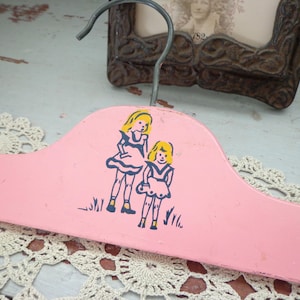 vintage children&#39;s wood clothes hanger painted chippy pink little girls