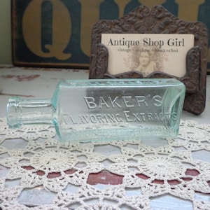 antique Baker&#39;s Flavoring Extracts bottle blue blown glass advertising