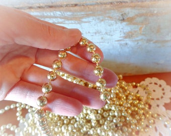 gold garland plastic bead strands 1/4" craft beads 18 yards