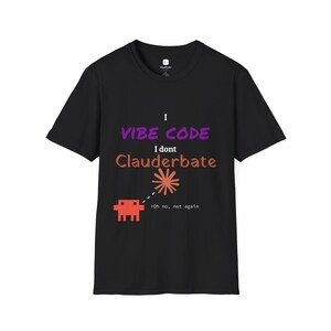 May include: A black short-sleeved t-shirt featuring the white text I, purple text VIBE CODE, white text I dont, and brown text Clauderbate. Below is a red pixelated alien graphic, a red starburst, and the white text >Oh no, not again.