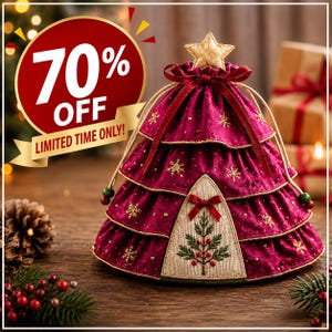 May include: A tiered, cone-shaped fabric pouch in deep magenta, featuring gold embroidered snowflakes, a drawstring closure, and a top star. A triangular beige panel displays an embroidered pine branch with red berries and a small red ribbon bow.
