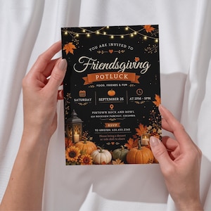 May include: A black Friendsgiving potluck invitation card featuring string lights, autumn leaves, pumpkins, sunflowers, and lanterns. The text includes event details for Saturday, September 25, from 2PM to 5PM at Pintown Rock and Bowl, 654 Rockview Parkway, Columbia, with RSVP to Kristen at 654.632.2343.