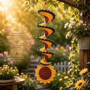 May include: A crochet sunflower wind spinner featuring a spiral design in yellow, dark red, and green yarn. The hanging decoration ends with a large, circular sunflower motif at the bottom and includes a loop at the top for easy suspension.