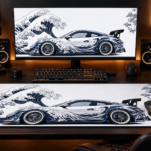 May include: A rectangular desk mat featuring a white and blue graphic print of a sports car integrated with a stylized ocean wave pattern. The design matches the image displayed on the computer monitor positioned directly behind the mat.