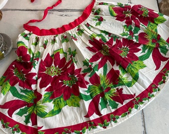 Delantal navideño vintage con flores de Pascua