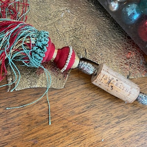 Wine cork and silver tassel