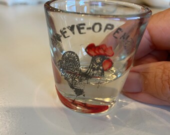 An eye-opener vintage shot glass