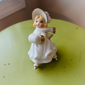 Vintage porcelain Holiday Ice Skater Figurine