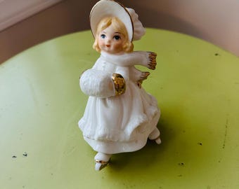 Statuetta vintage in porcellana raffigurante un pattinatore sul ghiaccio per le feste