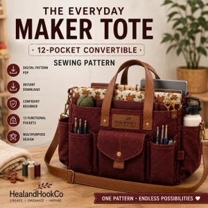 May include: A deep red canvas tote bag with brown leather handles and an adjustable shoulder strap. The bag features twelve exterior pockets, a central compartment, and a leather patch labeled HealandHookCo. Text reads The Everyday Maker Tote.