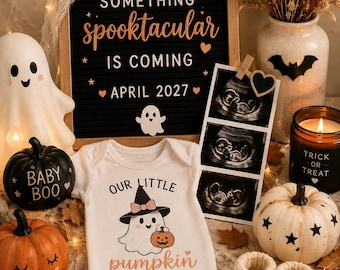 May include: A white baby bodysuit with a ghost wearing a witch hat and the text 'OUR LITTLE pumpkin IS ON THE WAY!', accompanied by a letter board reading 'SOMETHING spooktacular IS COMING APRIL 2027', ultrasound images, and knitted booties.