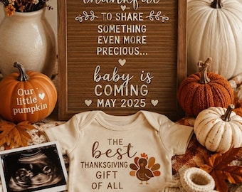 May include: A wooden letter board with the text WE ARE thankful TO SHARE SOMETHING EVEN MORE PRECIOUS... baby is COMING MAY 2025, a cream baby bodysuit with a turkey graphic and text, a sonogram, and small knit booties.