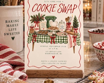 May include: A rectangular invitation card for a cookie swap featuring a green bow at the top and a red border. The text reads: BREAK OUT THE BUTTER IT'S TIME FOR A COOKIE SWAP, SUNDAY, DECEMBER 15TH AT 4 P.M., 123 MAPLE LANE BIRMINGHAM, MI.