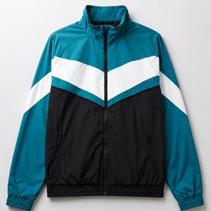 May include: A zip-up track jacket featuring a colour-blocked design with a teal upper section, a white chevron stripe across the chest, and a black lower section. The jacket includes a high collar, long sleeves with elastic cuffs, and two zippered pockets.
