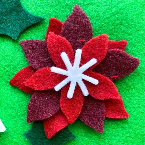 Christmas felt flowers and leaves, red cranberry and white with evergreen laurel leaves
