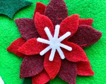 Christmas felt flowers and leaves, red cranberry and white with evergreen laurel leaves