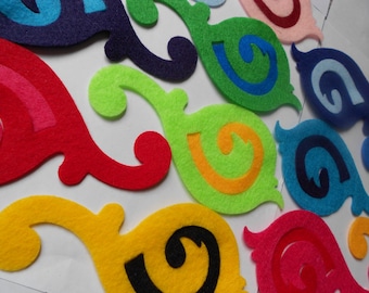 14 treble clef felt flourishes die cut pieces- mix and match outside and inside pieces.  Back to school music teacher felt