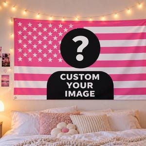 May include: A rectangular wall tapestry featuring a pink and white striped pattern with a field of white stars in the upper left corner. A large black circle with a white question mark and a black shape with the text CUSTOM YOUR IMAGE.