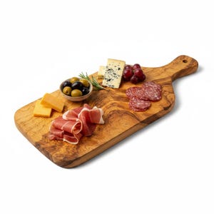 May include: A rectangular olive wood serving board with a handle, featuring a selection of food items including slices of yellow cheddar cheese, prosciutto, a small bowl of green and black olives, blue cheese, red grapes, and salami slices.