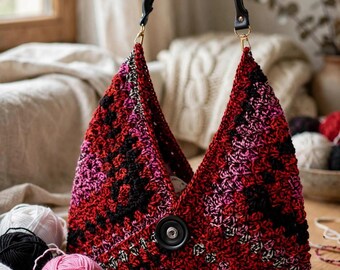Large striking Handmade crocheted bag fully lined and  large double button embellishment in reds and blacks, free shipping